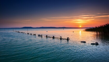 Obraz premium the lake balaton at sunset in hungary