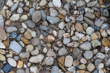 Top down view of rocks with different sizes and colours.