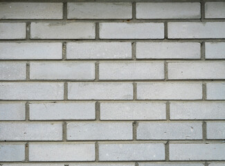 Light gray brick wall texture with horizontal pattern. Clean and uniform background, perfect for...