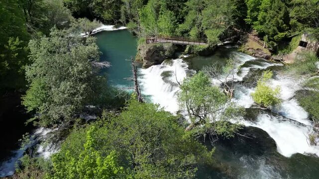 Amazing Martin Brod waterfalls on river Una in Bosnia and Herzegovina. Beautiful nature in Una national park with crystal clear water and amazing cascade waterfalls.