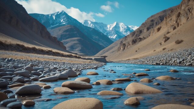 Water flowing near Pasu cone with scenic mountain landscape along rural highway in Pakistan