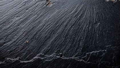 black or dark gray rough grainy stone texture background