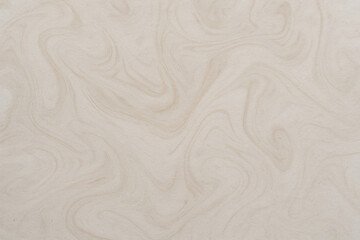 Obraz premium Swirling Cream Texture: A mesmerizing dance of light and shadow plays across a swirling cream-colored surface, evoking the fluidity and elegance of marbled stone.