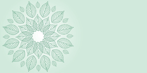 Decorative mandala of green leaves on a light green background.