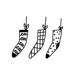 Hanging Christmas stockings cartoon doodle vector illustration isolated on white background. Cute hand drawn winter decoration outline drawing.