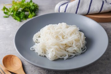 small noodles, thin rice noodles in grey plate 