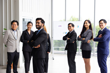group portrait business team : Portrait of successful Indian businessman leader and businesswoman Multiethnic people standing together at workplace