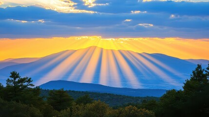 Golden Sunbeams Break Through Clouds Over Serene Mountain Valley