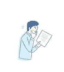 書類を見て困った表情をしている男性
