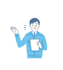 書類を持って話している作業服姿の男性