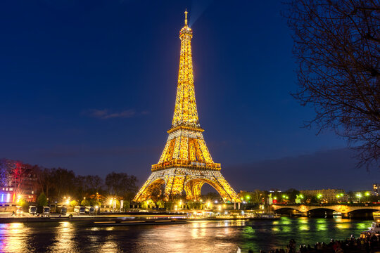 Eiffel tower at night illumination, Paris, France