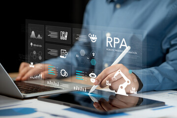 RPA Robotic process automation innovation technology concept. Businessman working on laptop using automate software system business for business and industrial workflow optimization.
