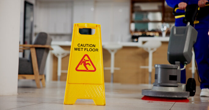 Cleaning, service and caution for wet floor, business and person with equipment for hygiene or sign. Board, information and warning for safety, disinfection and routine for sanitation of coffee shop