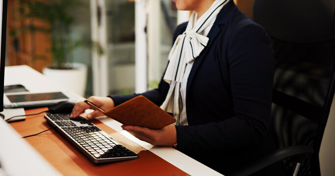 Woman, hands and concierge with passport for hotel booking or security clearance at check in. Person typing, receptionist and inspection with ID or booklet for travel policy or accommodation