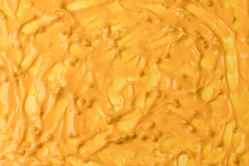Yellow sauce splashes as a background.