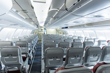 Inside empty wide body passenger plane cabin