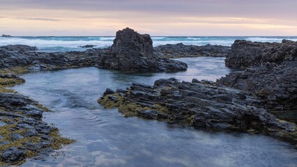 Rocky foreshore at low tide.