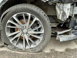 Car is severely damaged following a collision and road accident incident recently. This image...