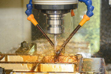 The CNC milling machine rough cutting the vacuum mold parts with oil coolant method.
