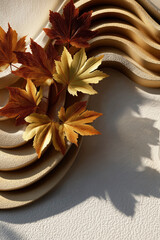 Autumn leaves arranged on textured surface with soft shadows creating a warm ambiance