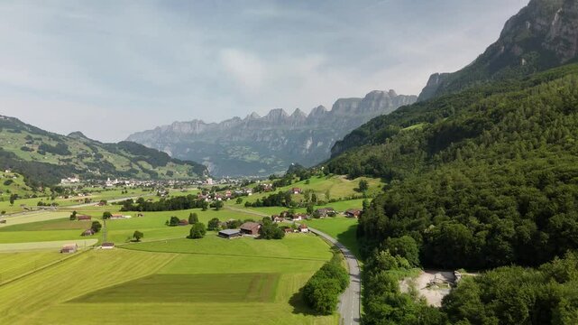 Scenic Aerial View of Rural Countryside and Alpine Landscape Near Flums, Berschis and Walenstadt, Switzerland &ndash; Drone Footage
