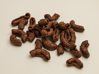 Chocolate crunchy snacks on white background