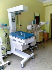 table for warming and resuscitating a newborn in the intensive care unit of a maternity hospital