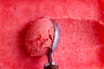 Watermelon sorbet texture background. Frozen fruit ice
