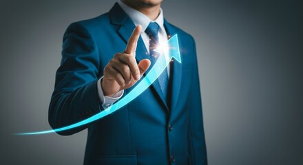 Businessman Touching Rising Arrow for Business Growth and Success Concept.