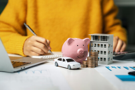 Property tax. Real estate investment planning or annual tax payment. Income-expenses. Annual tax deduction planning concept. Financial and tax system. Cars, houses, real estate.