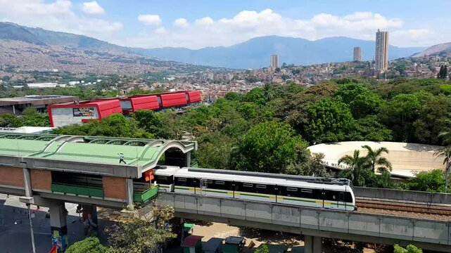 Medell&iacute;n, Antioquia, Colombia, panoramic view of a Medell&iacute;n Metro train, leaving Hospital Station