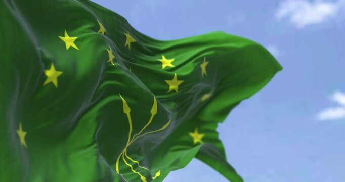 The Circassian flag waving in the wind on a clear day
