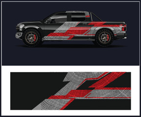 Obraz premium Black Pickup Truck with Red and Grey Tire Track Design Wrap