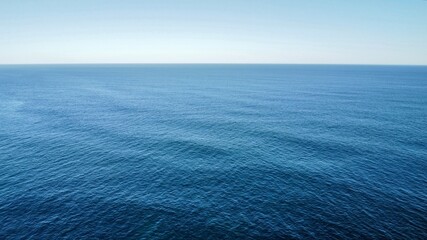 Morning Footsteps Along Serene Sandy Shoreline
