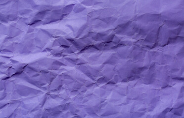 Obraz premium Close-up of purple crumpled paper background texture,Close-up of purple crumpled paper,Purple crumpled paper background,Abstract wrinkled purple crumpled paper texture background