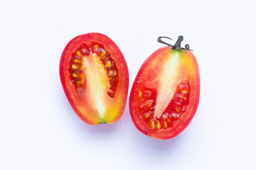 Close-up of halved tomato isolated on white background,Juisy ripe tomatoes isolated on white background