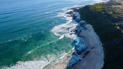 Morning Footsteps Along Serene Sandy Shoreline