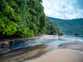 Peaceful Beach On Ilha Grande Near Rio De Janeiro: Gentle Waves Washing Onto Sandy Shore With Rocky...