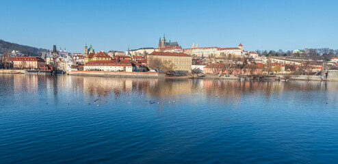 Vltava river with Mala Strana and Hradcany with Prazsky hrad castle above in Praha city in Czech...