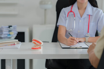 Dentist Consultation with Dentures