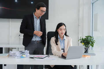 Business Professionals Collaborating at Desk