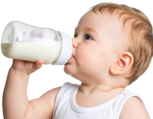A young baby with light hair drinks milk from a clear baby bottle while wearing a white sleeveless shirt.