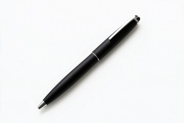 Minimalist black ballpoint pen with silver clip resting on a white surface