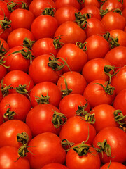 Red tomatoes background. Red tomatoes on the counter