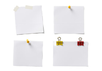 Four blank paper notes clipped to a white or transparent background, arranged in a neat grid pattern.