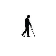 Obraz premium person walking with crutches silhouette on white background