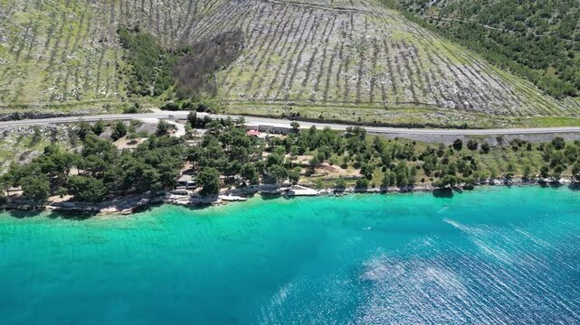 Aerial view of the Croatian coast with small campsites in the bay of Greba&scaron;tica close to Primosten in Dalmatia