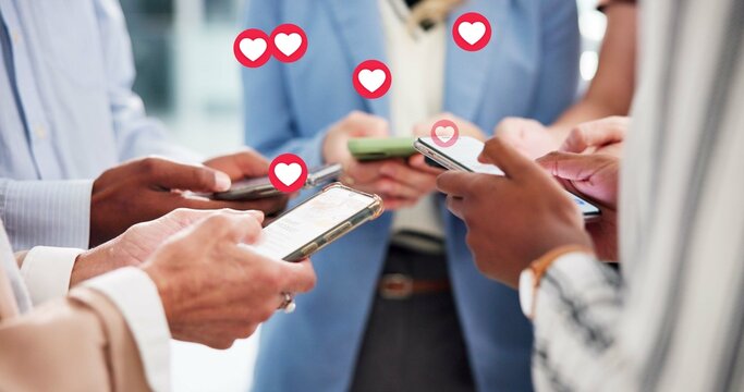 Hands, people and phone with emoji in office for social media, like post and followers reaction. Staff, mobile and overlay icons for online interaction, review comments and notification of heart sign