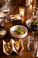 Plated gourmet starters with wine