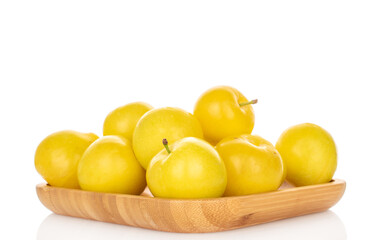 Yellow juicy plums isolated on white background, close-up.